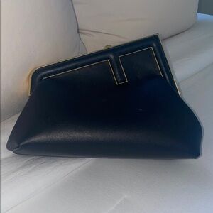 Chic Black Clutch with Gold Accents